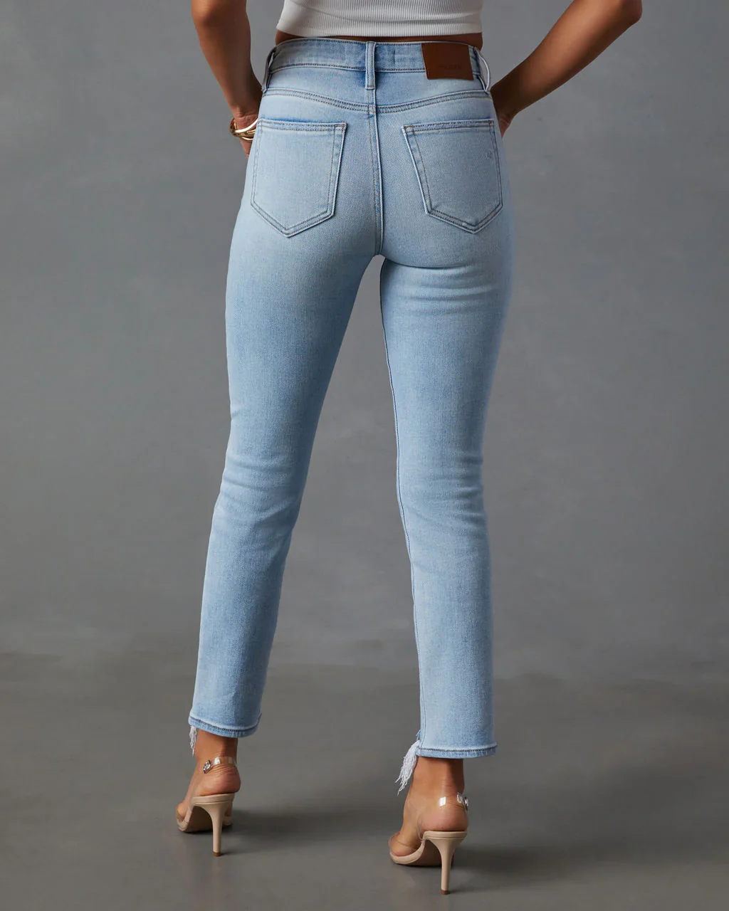 Riley High Rise Distressed Slim Jean