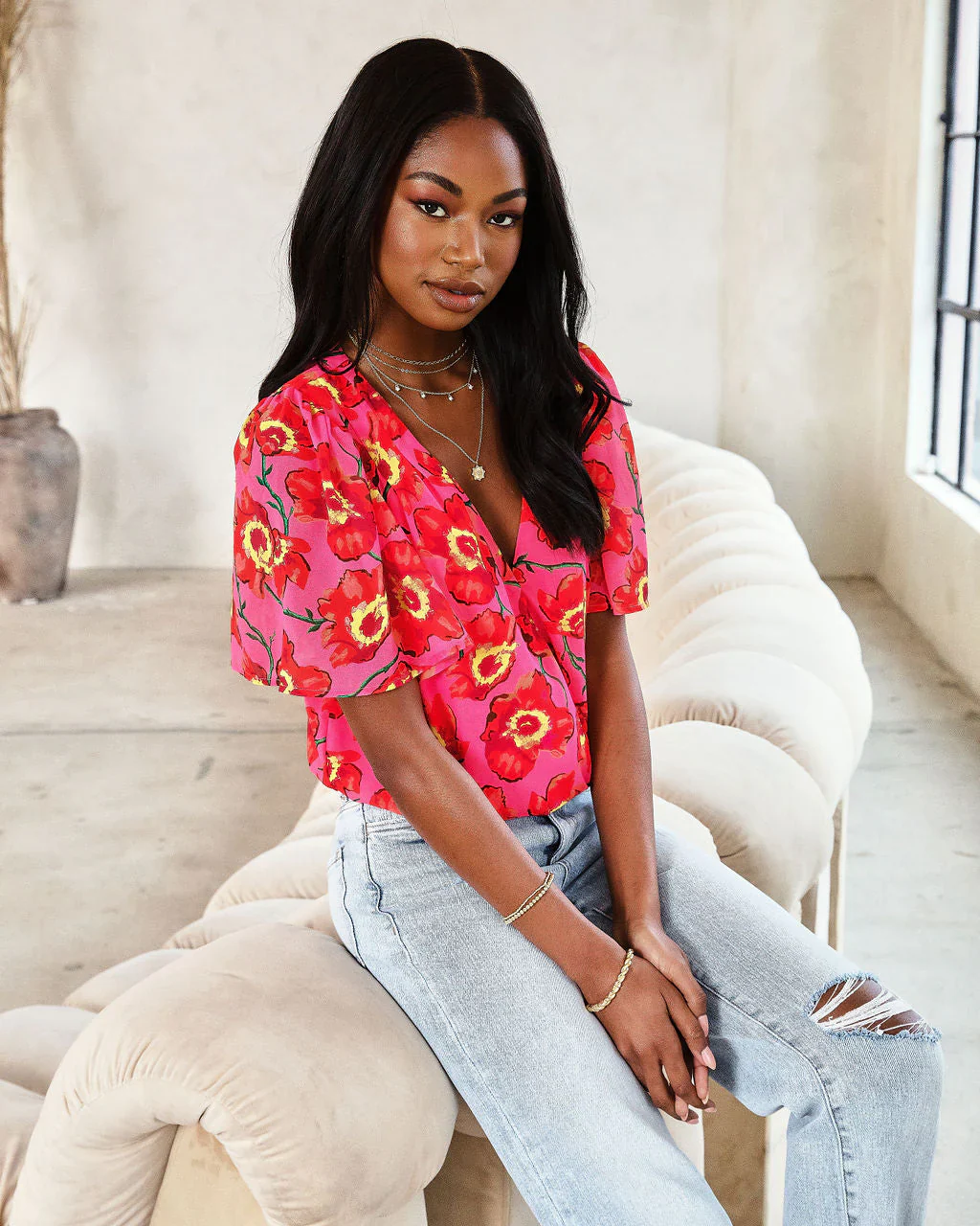 Kaliana Floral Flutter Sleeve Bodysuit